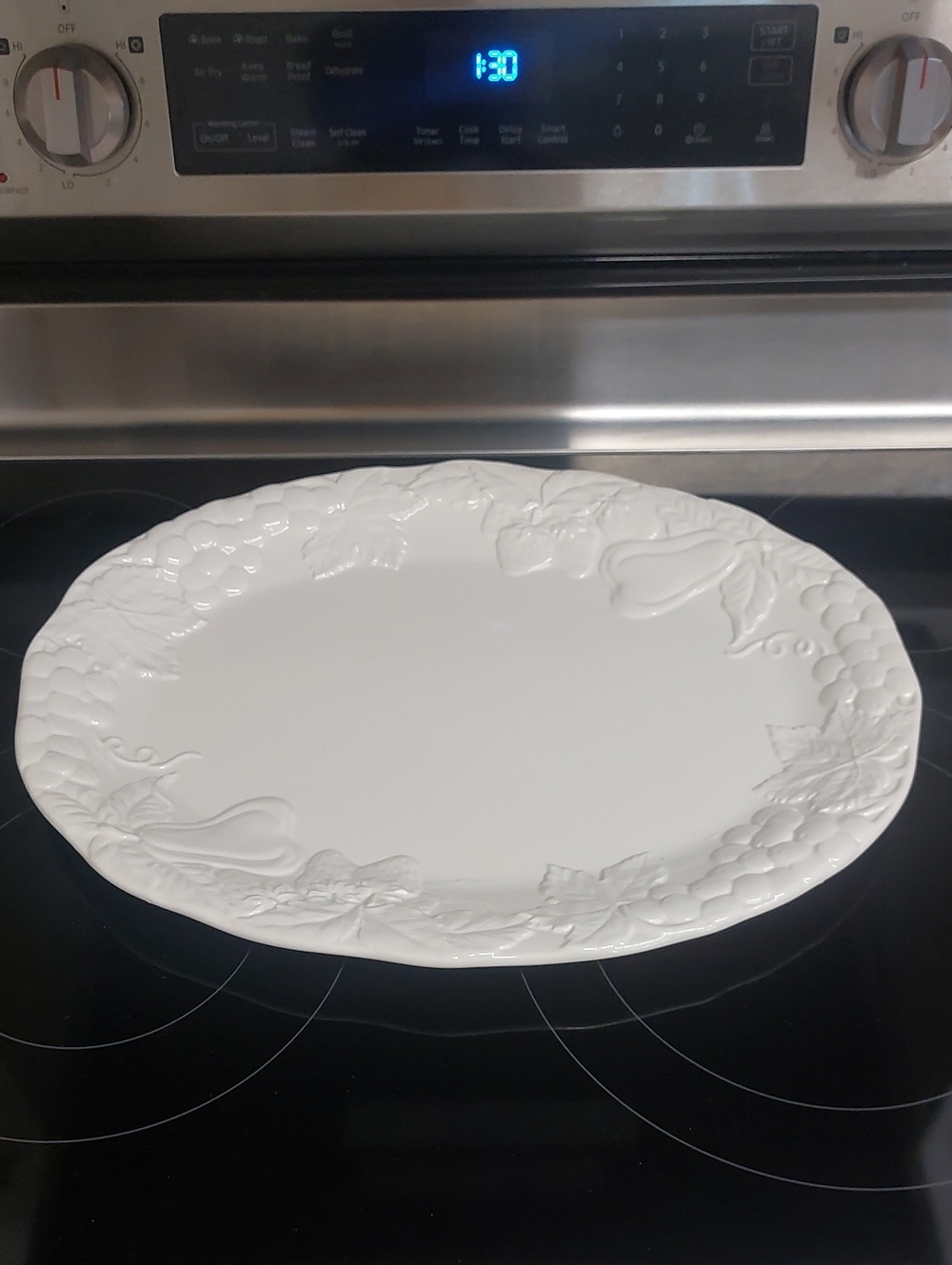 VINTAGE, Embossed White LARGE OVAL Ceramic Dinner Plate with Vine Motif